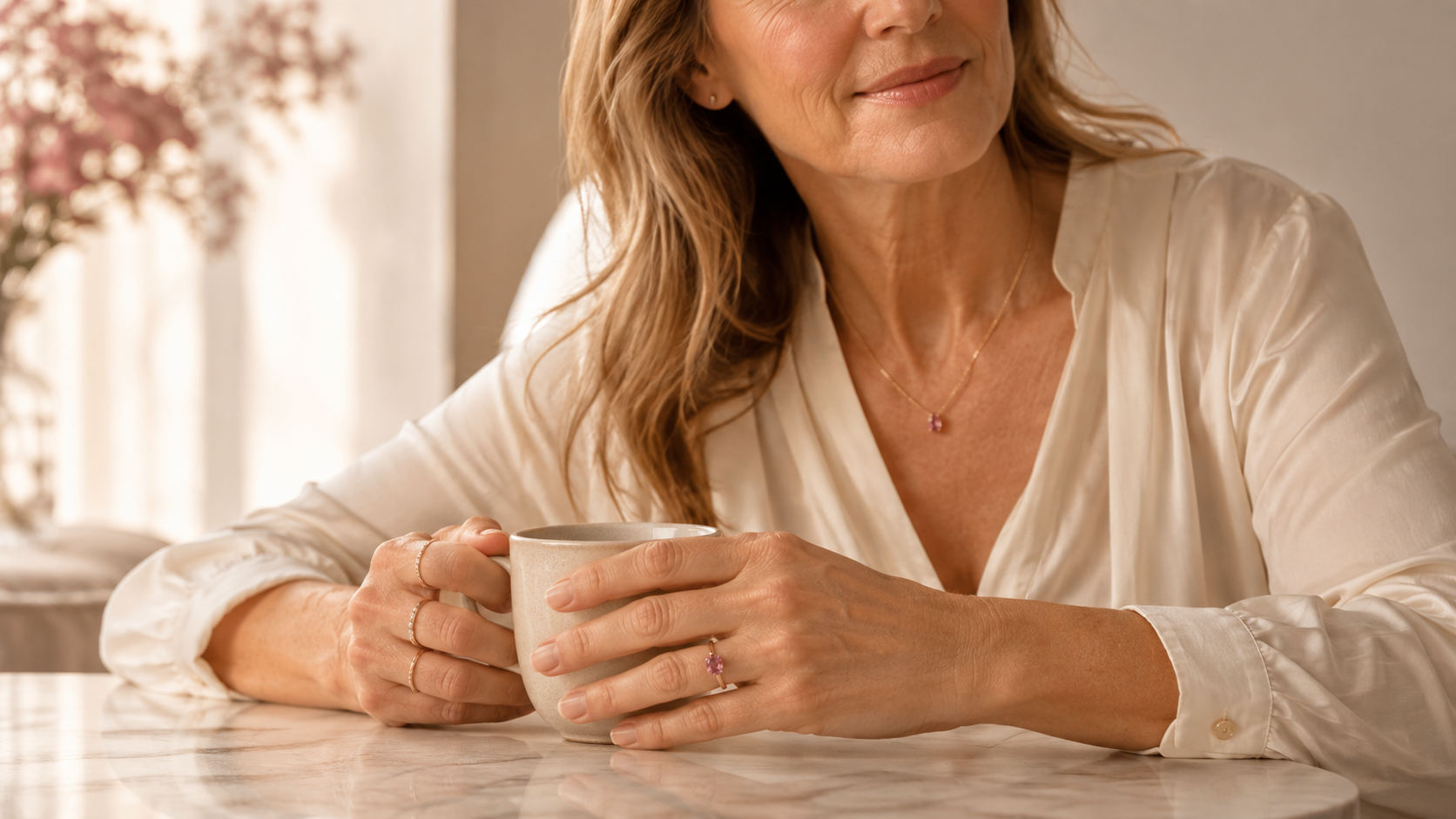 Woman wearing birthstone jewelry